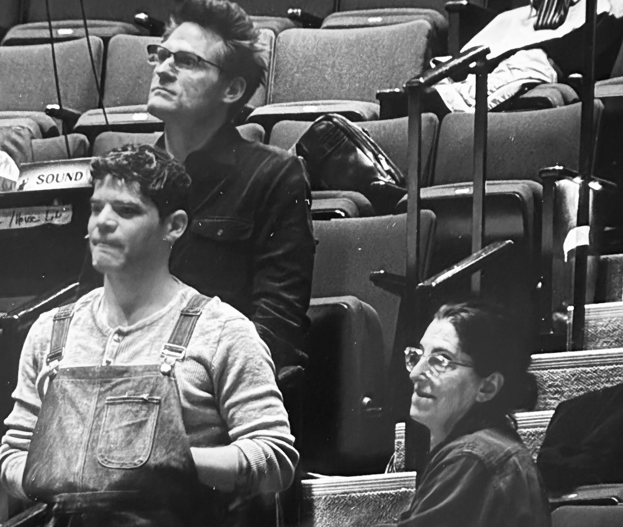 Kenneth Ferrone seated in a theatre with collaborators